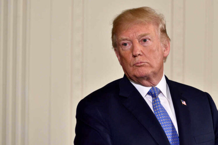 shutterstock_1081337402.jpg featured image Donald Trump in suit and tie.