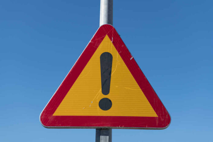 shutterstock_1306935058.jpg featured image Triangular warning sign with exclamation mark.
