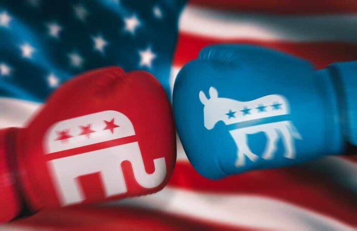 shutterstock_22205529211.jpg featured image Red and blue boxing gloves with political party symbols.
