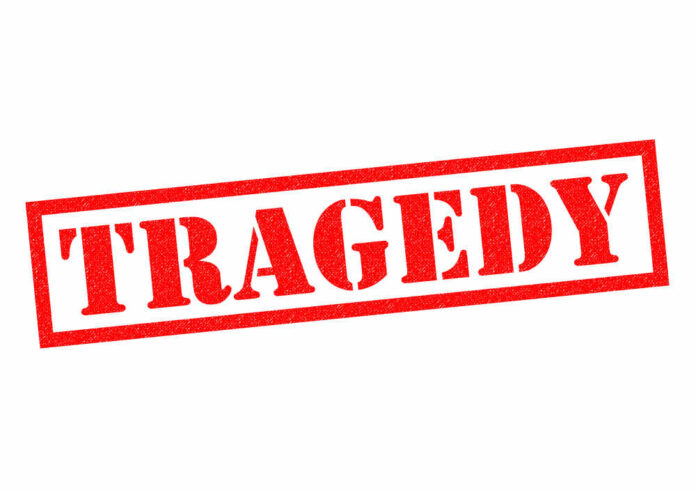 shutterstock_369304193.jpg featured image Red tragedy stamp on white background