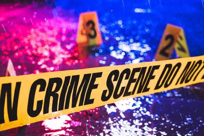 789623020 featured image Crime scene tape with blurred evidence markers.