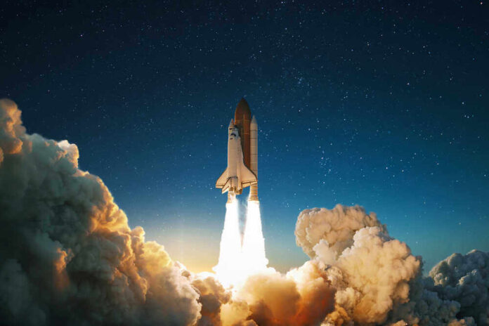 shutterstock_1574090395.jpg featured image Space shuttle launching into a starry night sky.