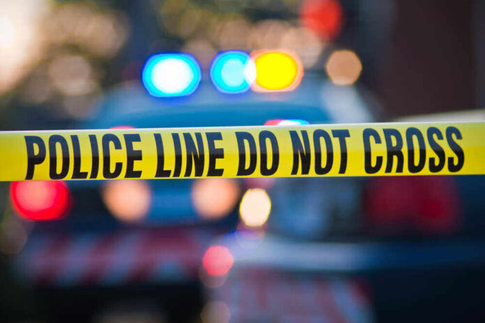 shutterstock_56280433.jpg featured image Police tape and lights at crime scene.