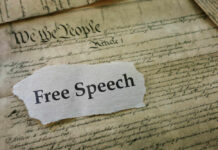 U.S. Constitution with Free Speech text overlay.