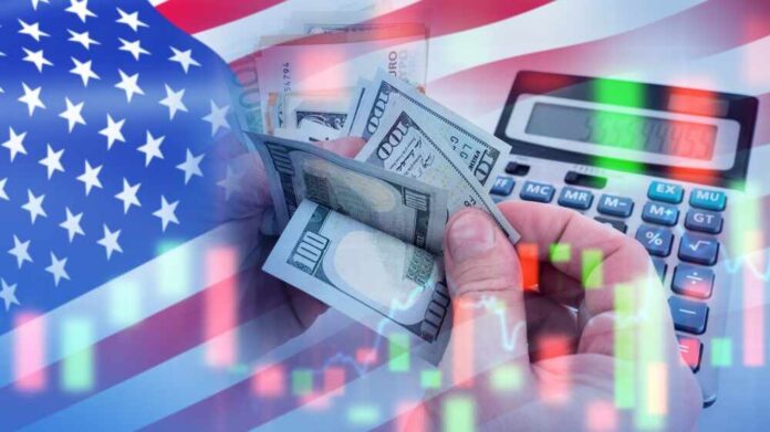 shutterstock_2482828605.jpg featured image USA flag calculator and hands holding dollars overlapping