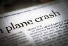 Newspaper headline about a plane crash.