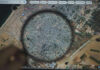 Magnifying glass highlighting Gaza on Google Maps