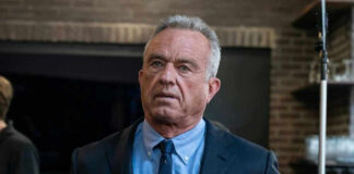 Robert F Kennedy JR in suit indoors