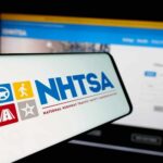 NHTSA logo displayed on a smartphone screen