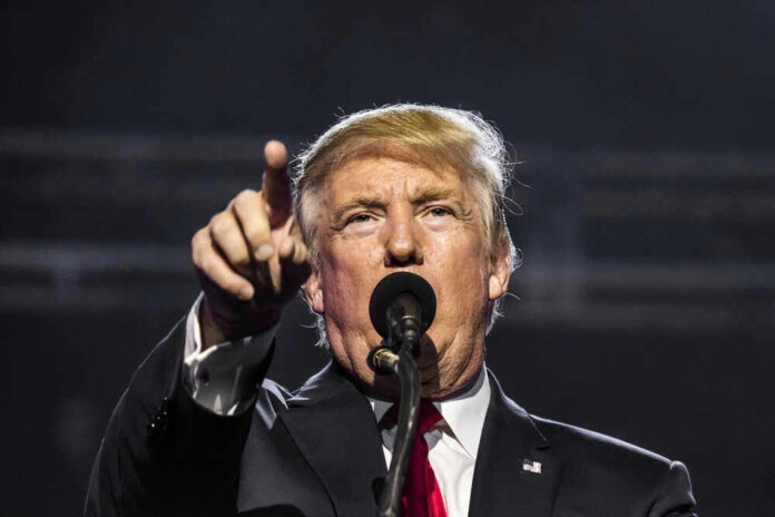 shutterstock_636139745.jpg Donald Trump points while speaking