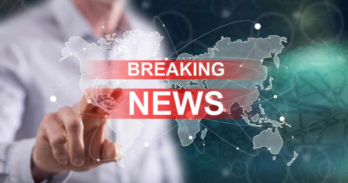shutterstock_1357251539.jpg Breaking news graphic over world map background
