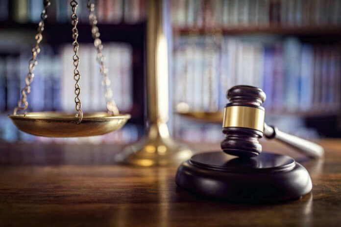 Scales and gavel on a judge's desk