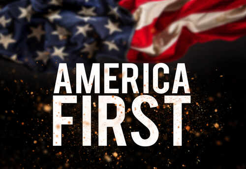shutterstock_708934708.jpg Text AMERICA FIRST overlaid on an American flag background