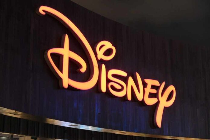 Illuminated Disney logo against a dark background