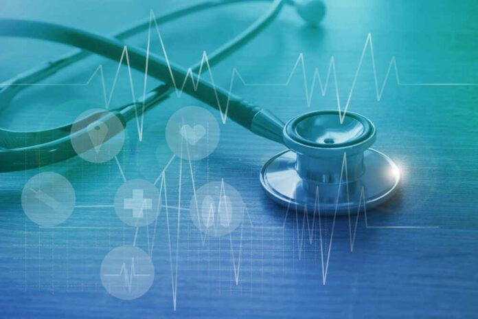 A stethoscope on a wooden surface with digital health icons and a heartbeat graph overlay