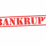 Bankruptcy Shocker: $2 Billion Disaster Red stamped word bankrupt on white background