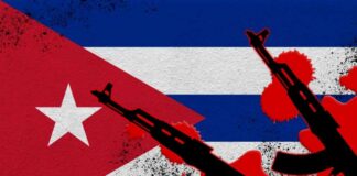 Cuban flag with silhouettes of guns and red splashes