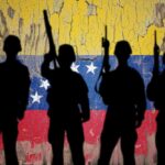 VENEZUELAN TERRORISTS Hacked ATMs Across America Silhouettes of soldiers in front of the Venezuelan flag