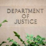 Court SHOCKER: Trump’s DOJ BLOCKED Sign displaying 'Department of Justice' on a stone wall