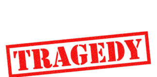 Red tragedy stamp on white background