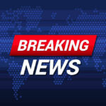 Breaking News text on world map background.