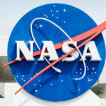 NASA Moon Countdown Halted NASA logo displayed prominently against a blue background