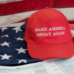 Obama-Era Regulations DEMOLISHED — MAGA Cheers Make America Great Again hat on American flag