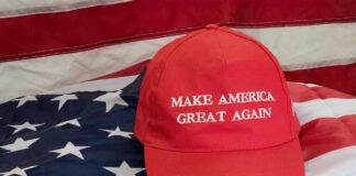 Make America Great Again hat on American flag