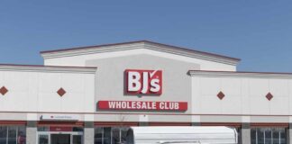 Exterior view of BJ's Wholesale Club with parked cars