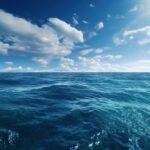 Ocean Nightmare: Kid Makes Heroic Decision A vast ocean under a clear blue sky with scattered clouds
