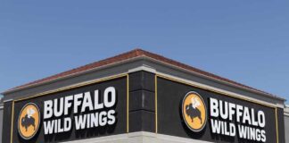 Exterior view of a Buffalo Wild Wings restaurant with a clear blue sky