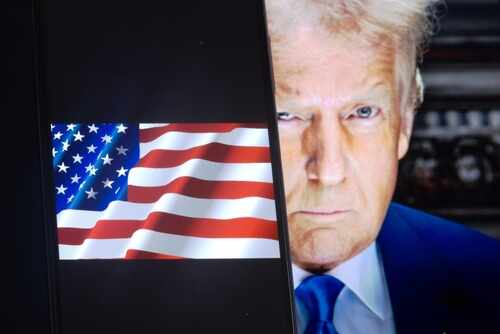 Close-up of a political figure with an American flag in the background