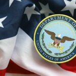 War Department INSIDER Laundered Millions Department of War emblem on an American flag background