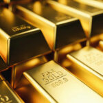 Venezuelan Gold Airlifted To United States Close-up of stacked gold bars with inscriptions