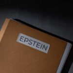 A brown folder with the label 'EPSTEIN' on it