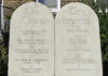Stone tablets displaying the Ten Commandments in engraved text