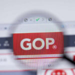 Electoral Map Bombshell: GOP Eyes 24-4 Edge Magnifying glass focusing on GOP website logo.