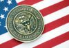 Navy Department seal on an American flag background
