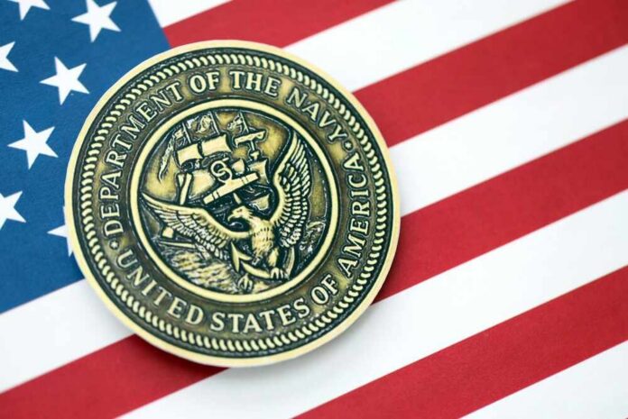 Navy Department seal on an American flag background