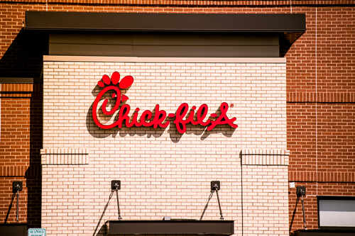 shutterstock_716002696 (1).jpg Chick-fil-A restaurant sign on a brick wall