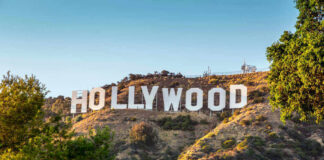 Hollywood sign on a sunny hillside.