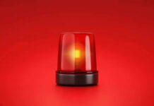 Deadly Umbrella Incident? Red emergency light on solid red background.