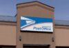 Exterior view of a United States Post Office building with a prominent sign