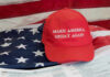 MAGA Warrior Showdown: Trump Picks His Fighter Red Make America Great Again hat on American flag