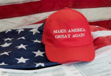 MAGA Warrior Showdown: Trump Picks His Fighter Red Make America Great Again hat on American flag