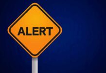 Gas Station INVASION — 6 States Targeted Orange alert sign with the word 'ALERT' displayed prominently
