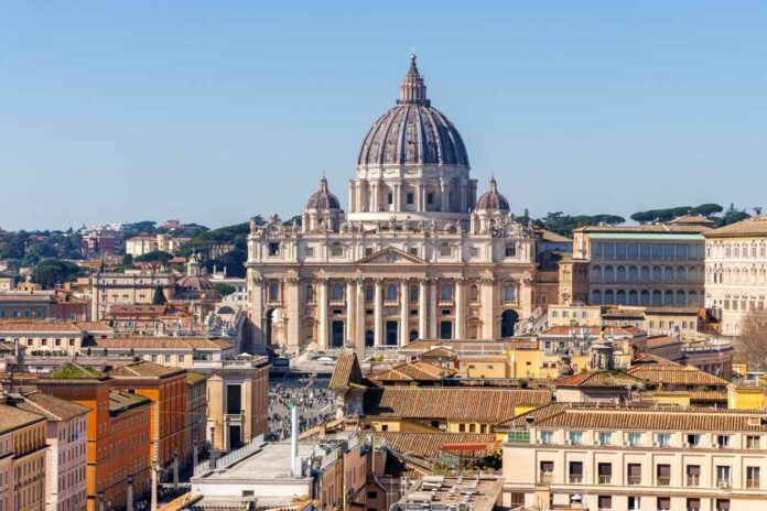 Rome,Skyline,With,St.,Peter's,Basilica,In,Vatican,City,From St. Peter's Basilica in Rome with a clear blue sky