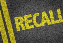 RECALL: Brake Glitch On 421,000 Vehicles Yellow 'RECALL' text on a dark asphalt surface