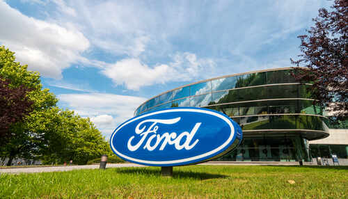 shutterstock_719335846 (1).jpg Ford logo in front of a modern corporate building
