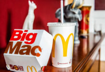 McDonald’s Horror: Oil Attack On Worker A Big Mac box and a McDonald's drink on a wooden table